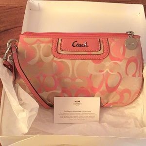 Coach Signature Collection Pink Wristlet. New in box with paper & card.